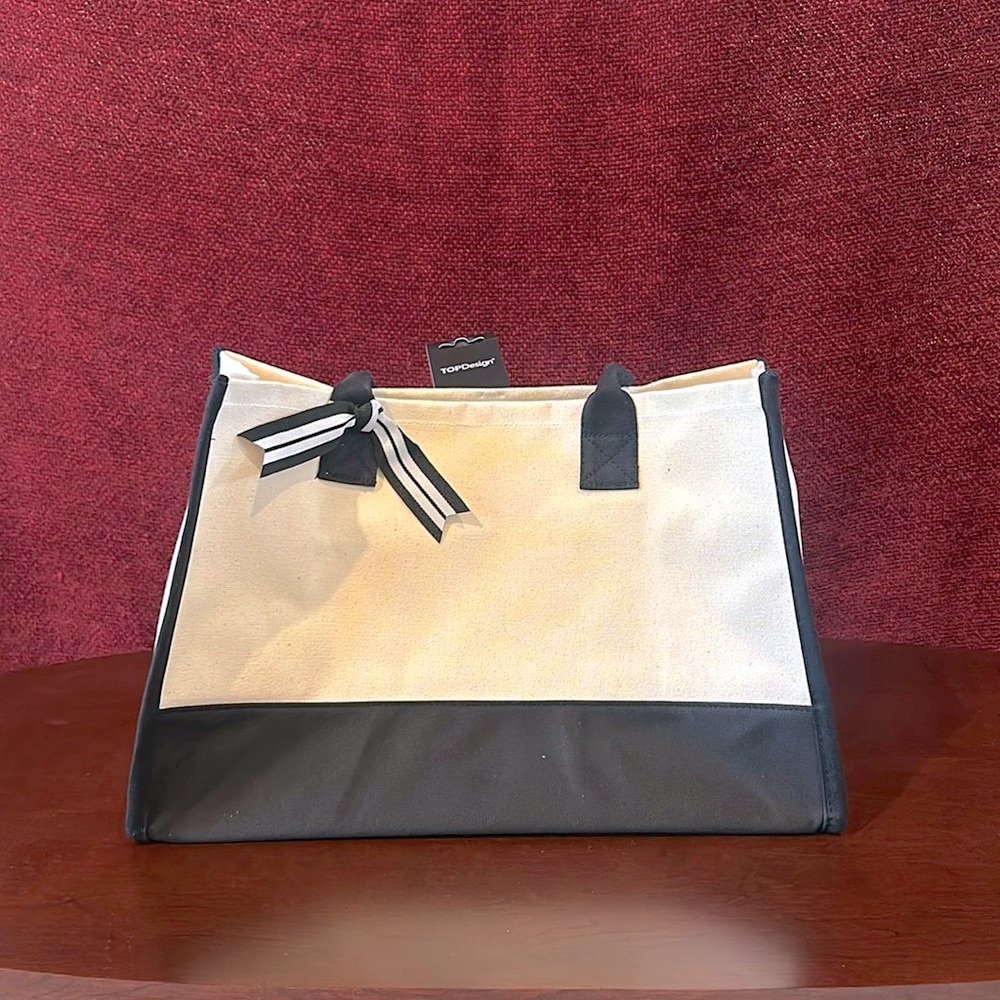 TOPDesign canvas tote bag with decorative ribbon.  New with tags and in bag.